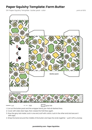 Cream paper butter pack with a face, black cow spots, grass blades and daisies